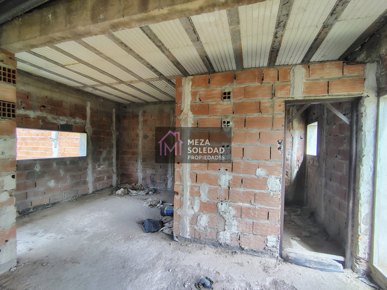 LOTE CON CONSTRUCCION A TERMINAR