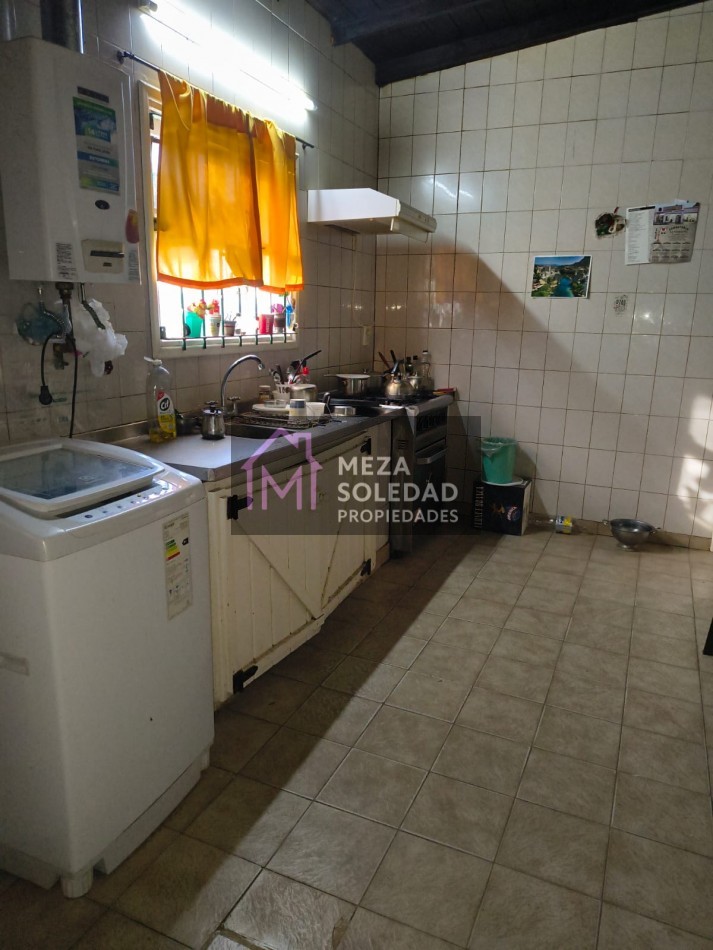 CASA CON DEPARTAMENTO 