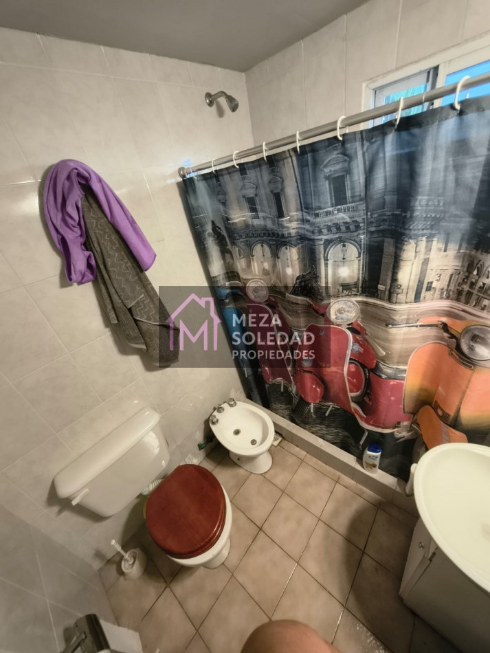 CASA CON DEPARTAMENTO 